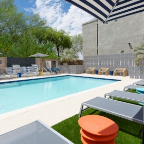Pool with  lounge chairs  and Outdoor Kitchen Pool with  lounge chairs  and Outdoor Kitchen